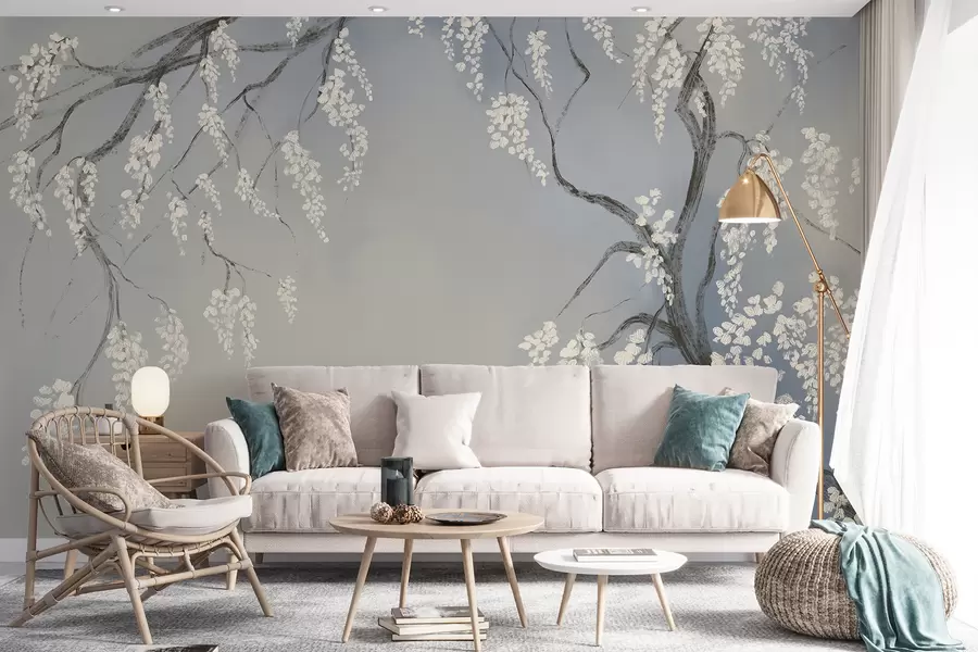 murais de parede Delicada cerejeira branca com flores desabrochando em galhos contra fundo azul w08243v1